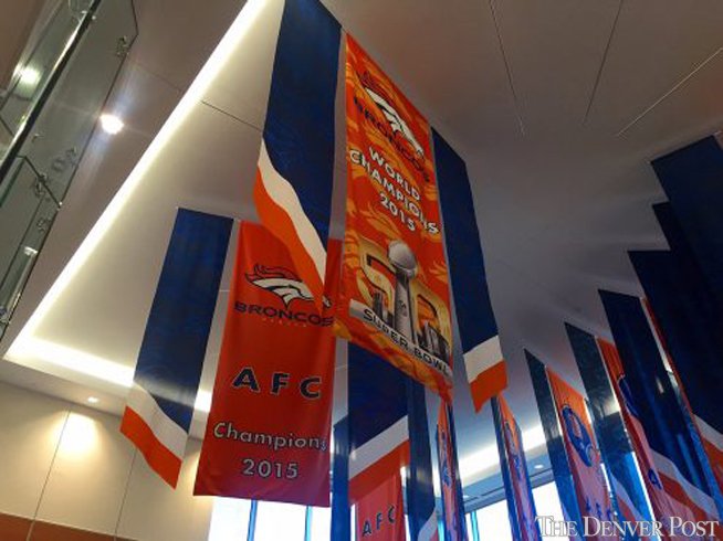 PostBroncos's tweet image. #Broncos hang championship banners in the lobby of their Englewood headquarters: dpo.st/1ssJ2NH