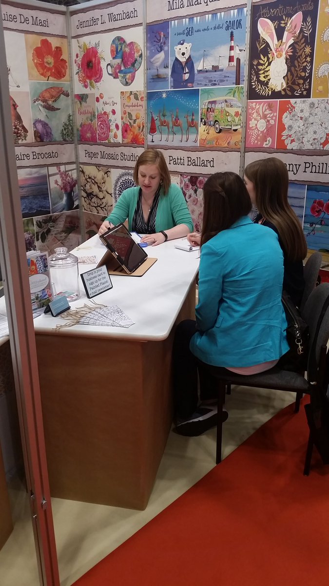 Our licensing coordinator Leah Cochran meeting w/ <a href="/OpenRoadBrands/">Open Road Brands</a> at <a href="/surtex/">SurTex</a>. #artlicensing #paintedplanet #surtex