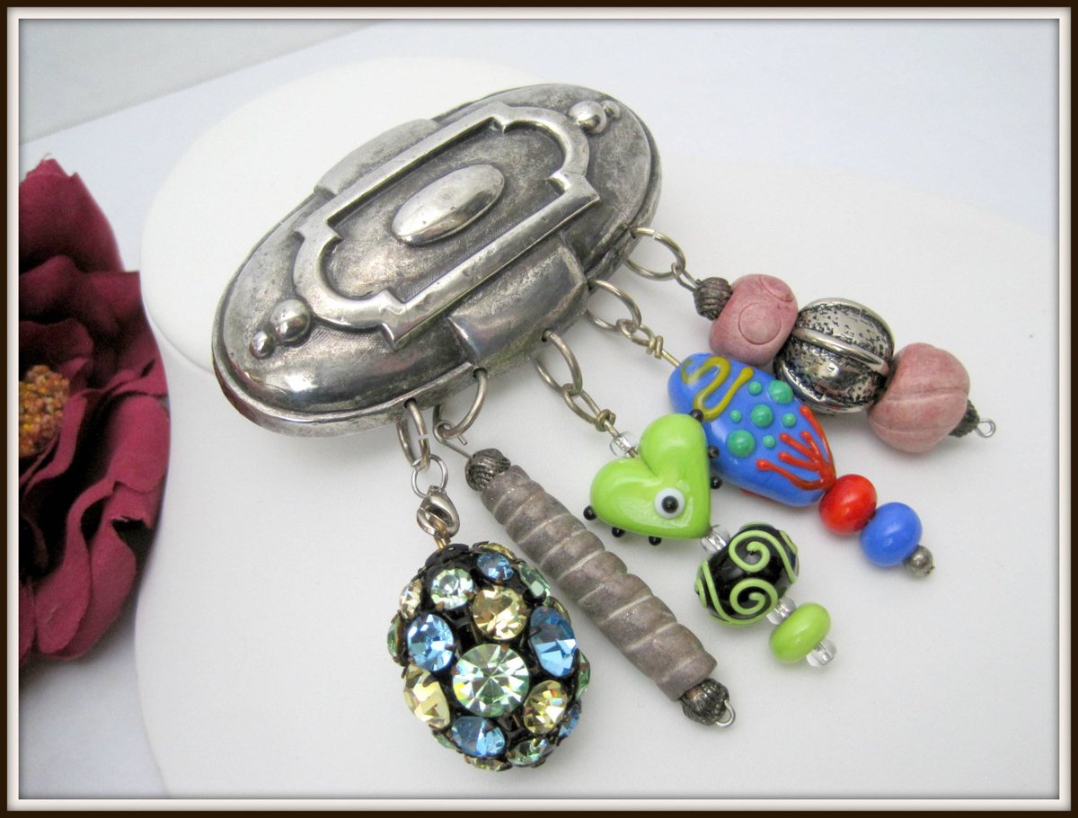 vintagobsession's tweet image. Artisan Made Brooch Silver Tone Metal Glass Bead Dangling Brooch etsy.me/1ry7Kvm #Etsy #TechnoIndustrial