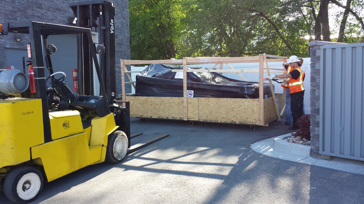 Another BIG piece of new equipment has arrived! It's a router that cuts, scores, and routes custom shapes.