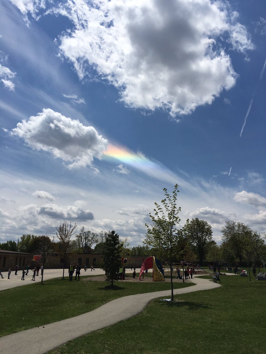Sunny skies and a unique rainbow cloud over #jameshillier this afternoon. <a href="/gedsb/">Grand Erie District School Board</a>