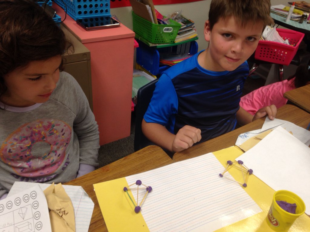Amy_Allen14's tweet photo. Layla and Buck comparing triangle pyramids and square pyramids. #austinblueroos #stemstation https://t.co/O9pSfYGuWM