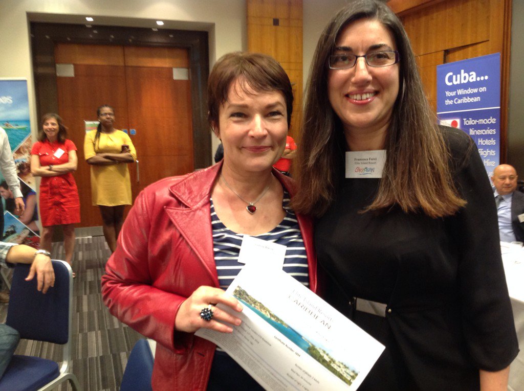 _LoveCaribbean's tweet photo. Szilvia Bacsa of Not Just Tral won 5 nights stay @VerandahResort @EliteIsland #ctoroadshowlondon @RMILimited https://t.co/mMI3CyEL2b