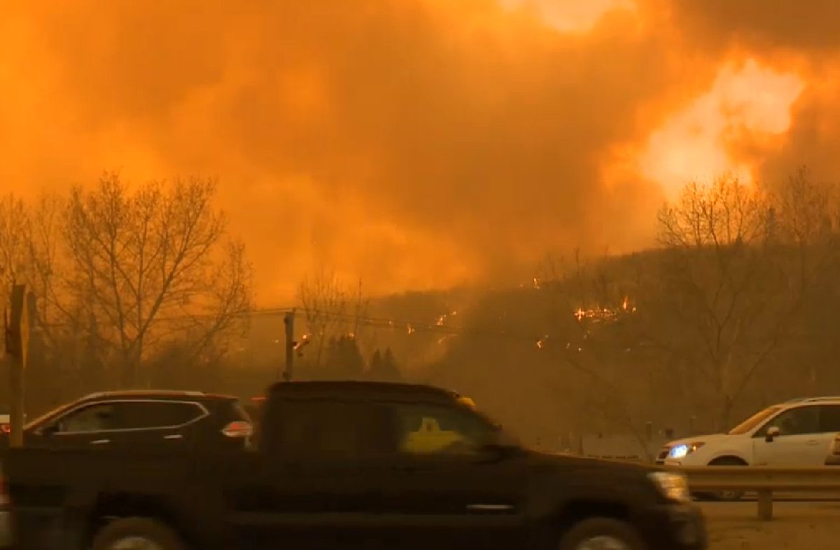 CHED880's tweet photo. UPDATED - Pair of residential explosions prompt slow down in re-entry plan for #ymm #ymmfire https://t.co/Kb1mvAMdw7 https://t.co/Wj26Ugfr7C