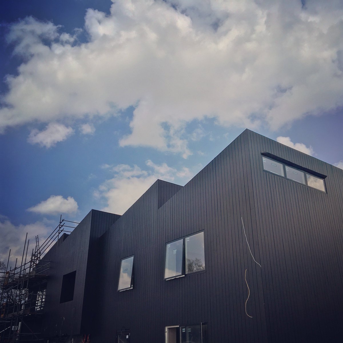 The scaffolding is coming down, revealing the new office behind #architecture #lincsconnect #design