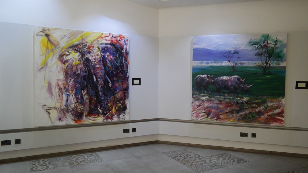 Paintings by Artist Adrian Nduma on display at the #COLOURise Exhibition.
