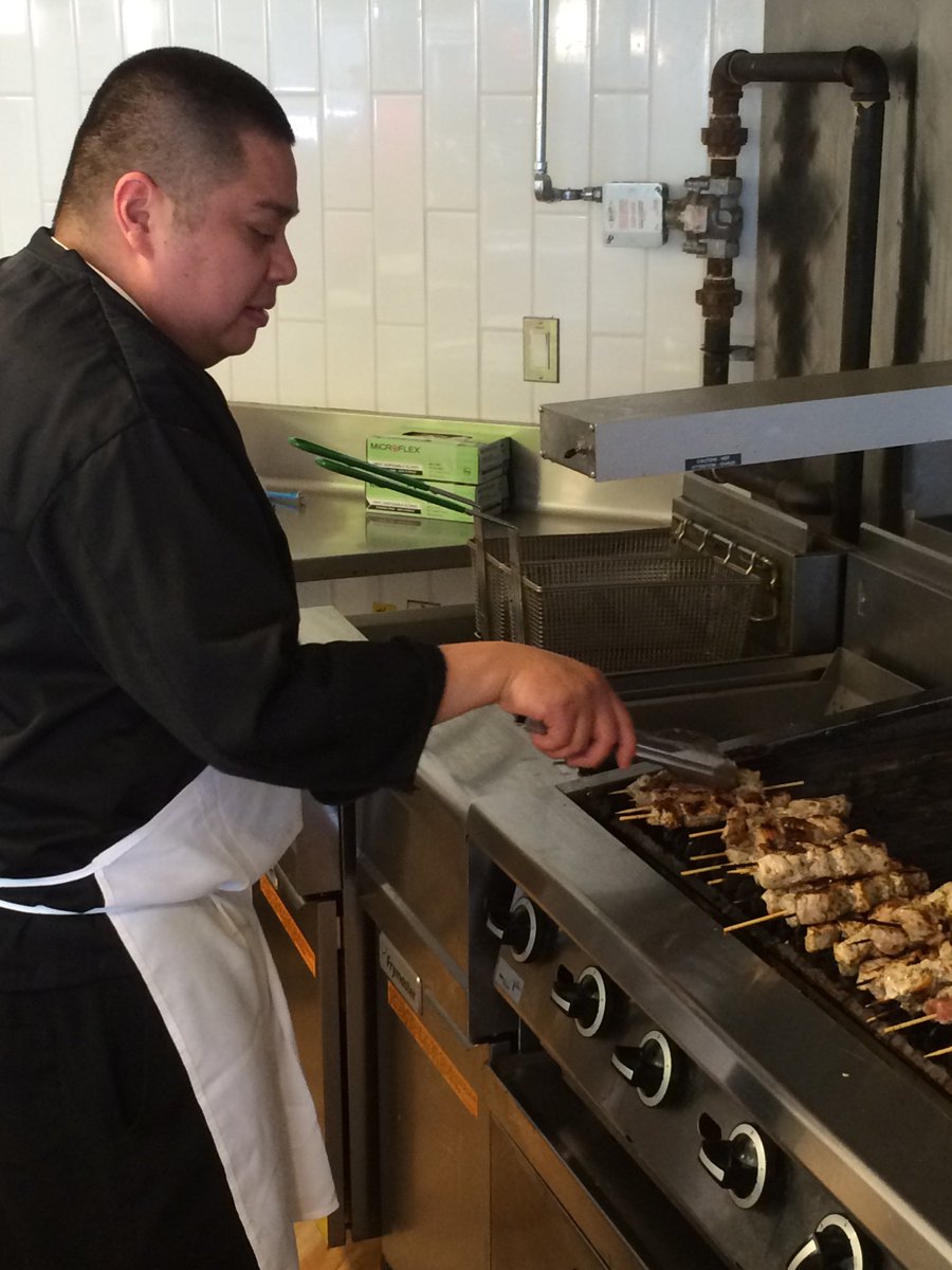SjuCaf's tweet photo. Our grill master Diego is getting souvlaki skewers ready for lunch. #Chartwells #grillskills #Fresh https://t.co/I330Dgs9Af