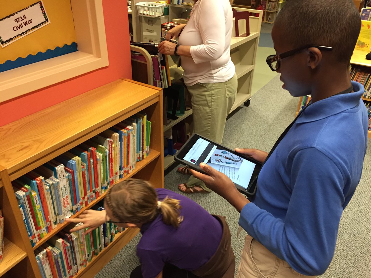 kickkrowley's tweet photo. Reading Escape from Mr. Lemoncelllo's Library and finding clues in our own library! #breakoutedu #readeveryday https://t.co/G18yRUDjbw