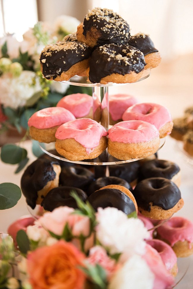 A <a href="/diggitydoughnut/">diggity doughnuts</a> cake? Don't mind if we do! bit.ly/27zeWrv #WeddingWednesday #doughnuts
