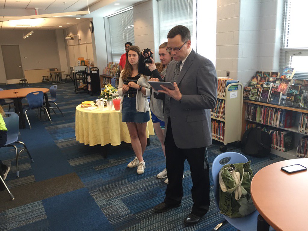 Yorktown's Ass't Principal Dr Doll helps direct and coordinate the Artist of the Month Program@APSVirginia