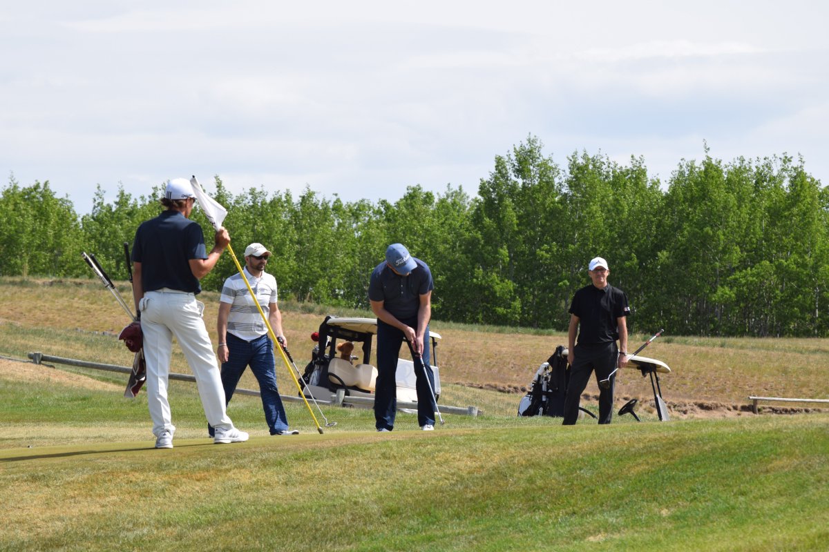 <a href="/jasonhnatiw/">Jason Hnatiw</a> putting out on hole #17 <a href="/wolfcreekgolf/">Wolf Creek Golf</a> for Round 1 of the Team Match Play. Round 2 begins at 3pm.