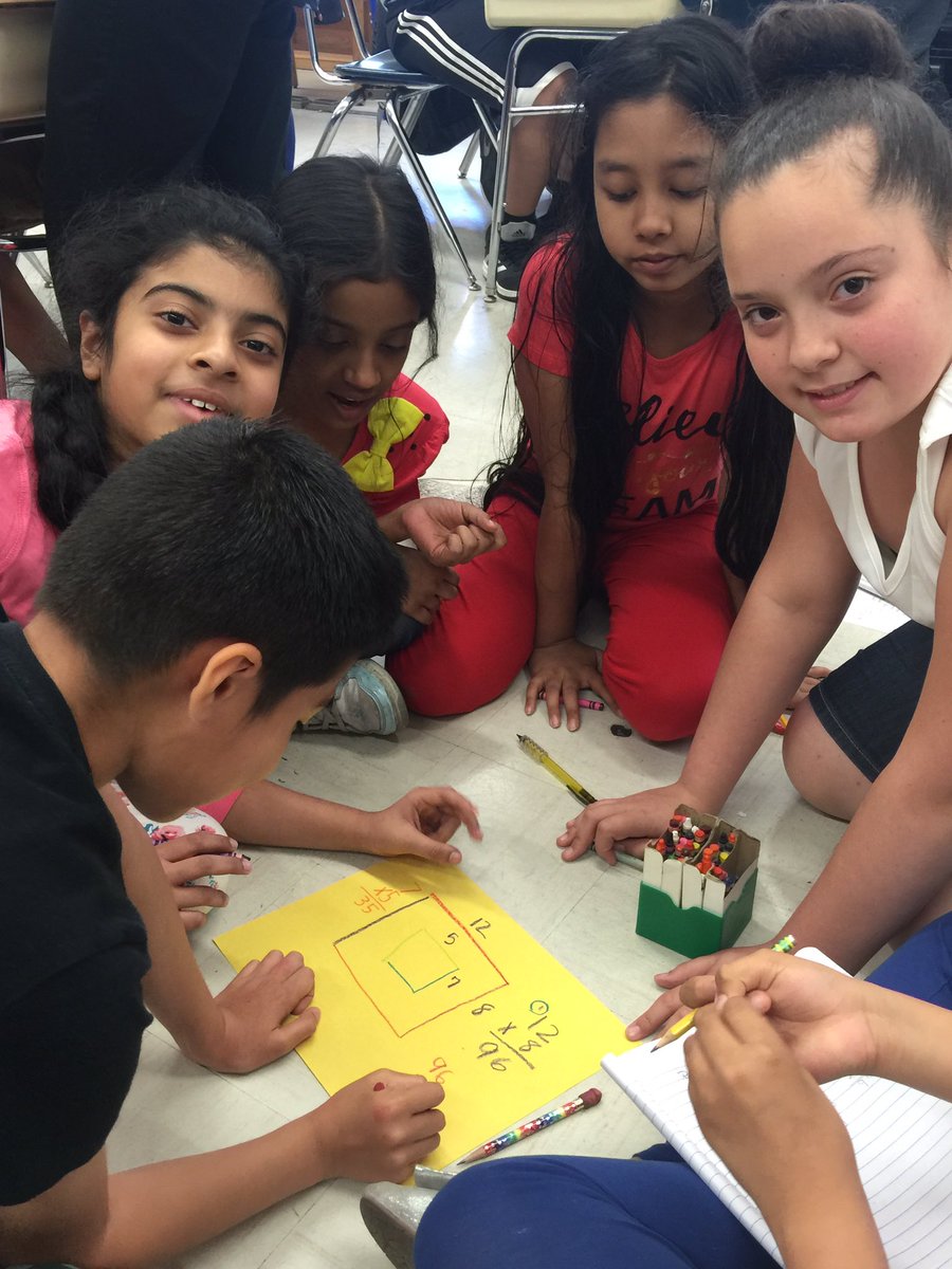 Collaboratively working to solve a math problem.#ps76q