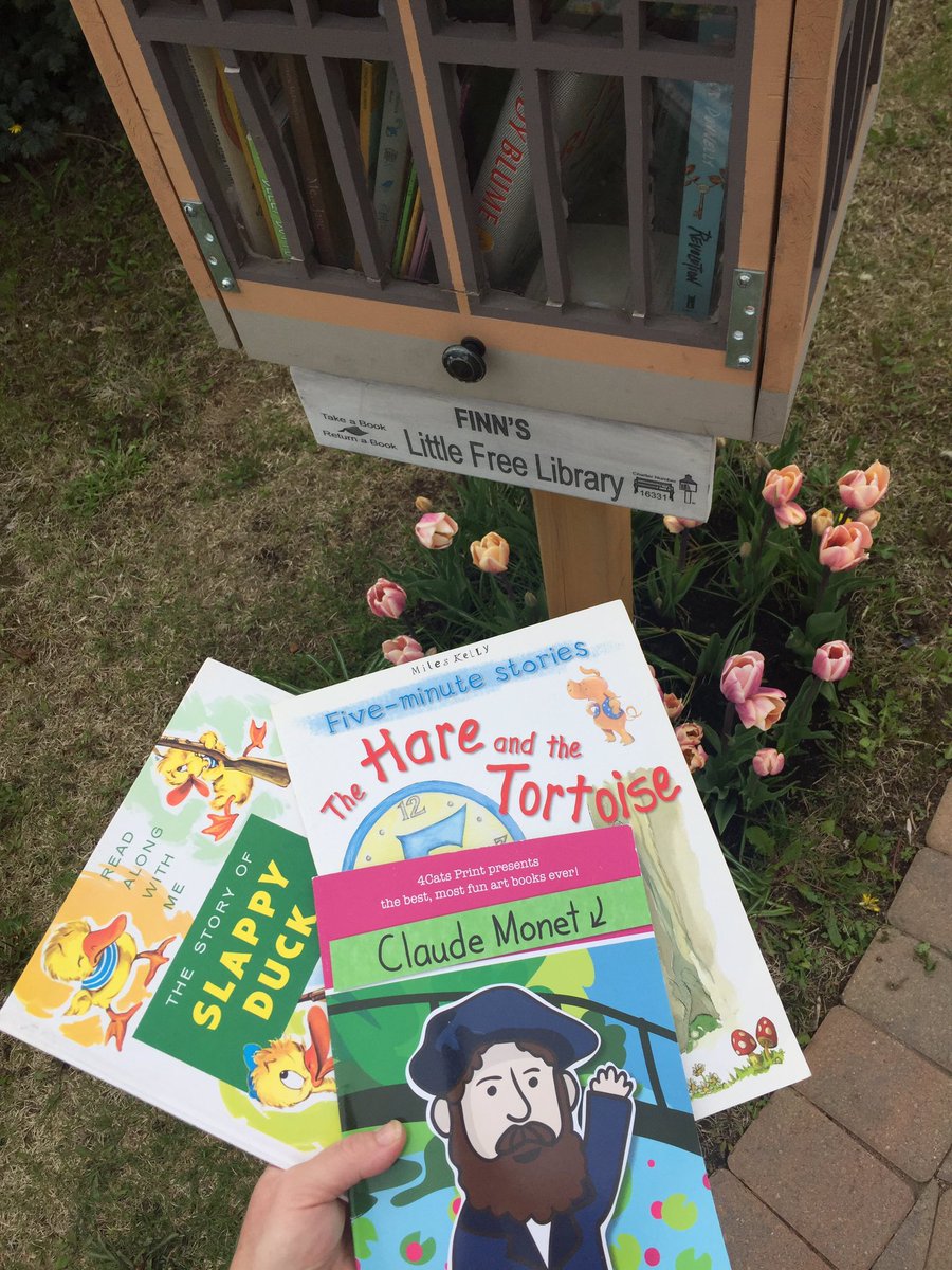 FinnsLibrary's tweet image. Some fun #books for #kids in Finn&apos;s #LittleFreeLibrary with blooming &apos;Sweet Love&apos; #tulips. #read #TBay #lfl