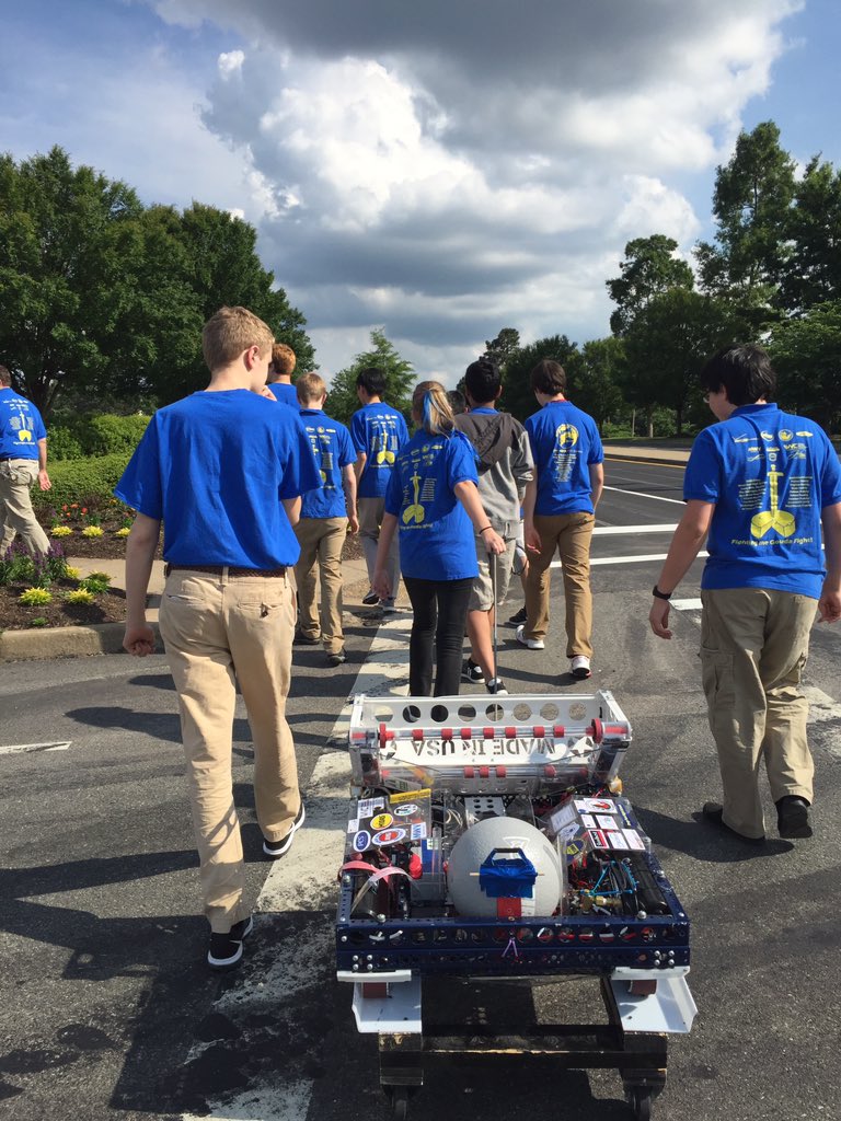 frc1086's tweet photo. #Safetywise robots always cross with the light on their way to demos @HenricoSchools #FitforSTEM night #TwinHickory https://t.co/FWPZIFbHgl