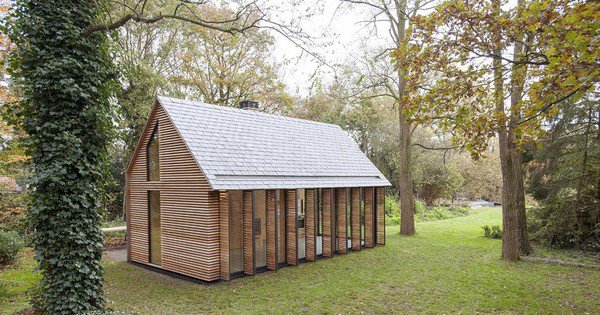 Contemporary cottage opens wide with a wall full of shutters puls.ly/EwTSAQ #news