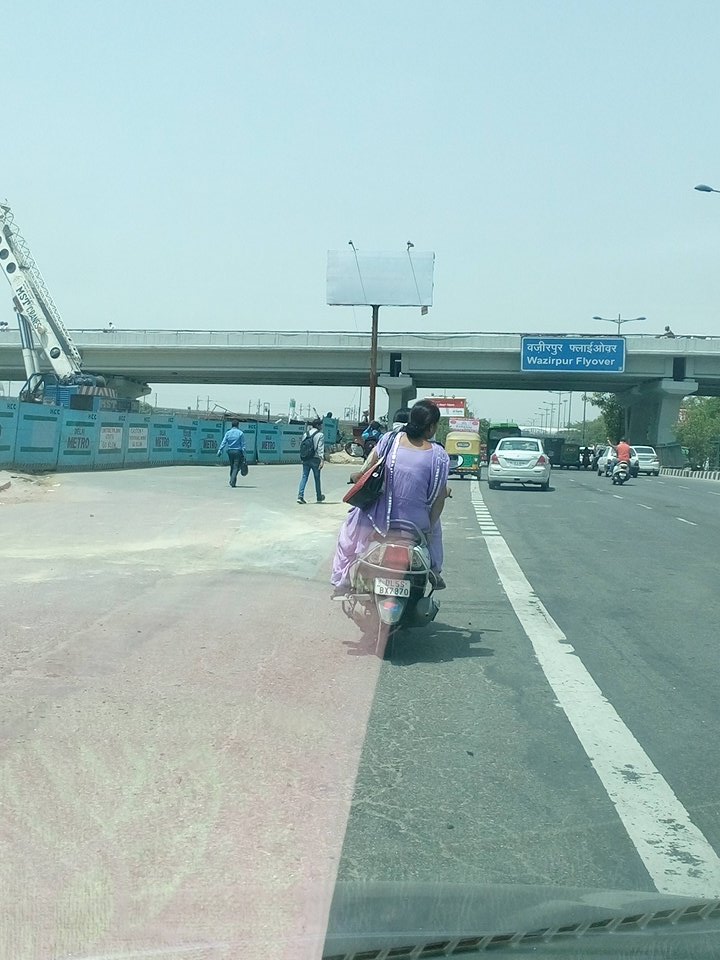 preshanadami's tweet photo. @dtptraffic near NSP two females on 2 wheeler, driving without v helmet. https://t.co/H3K4lX08xY