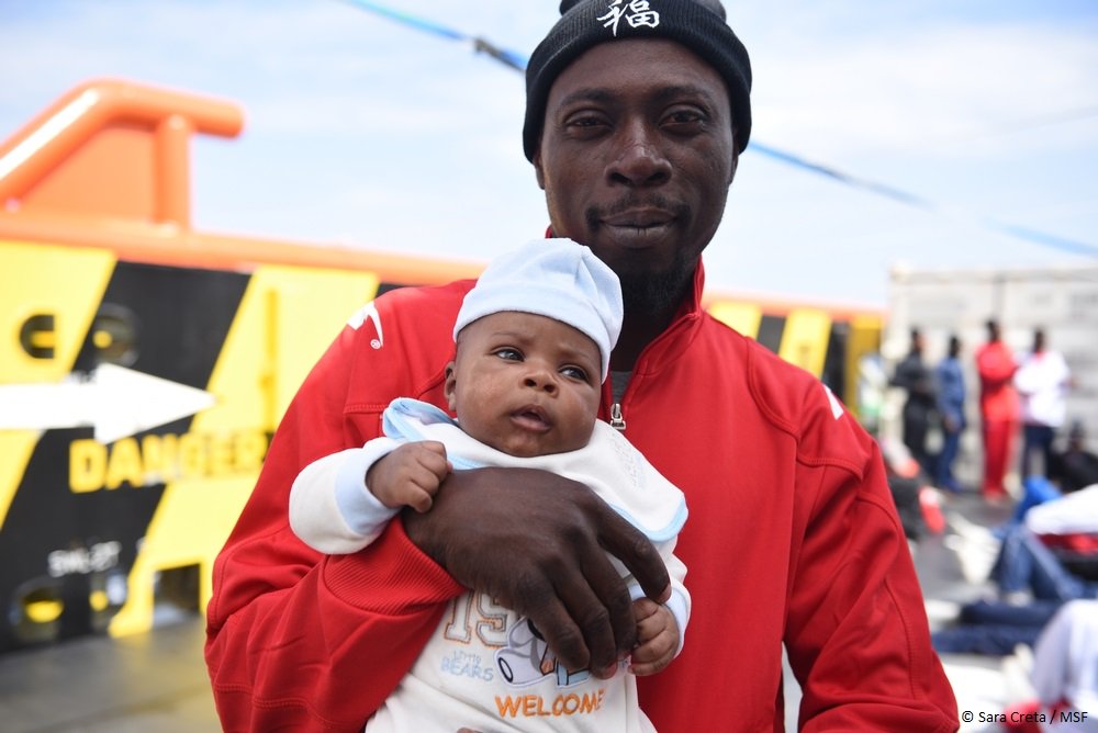 Just another dad, doing his best, to give his newborn son a chance at a better life...
