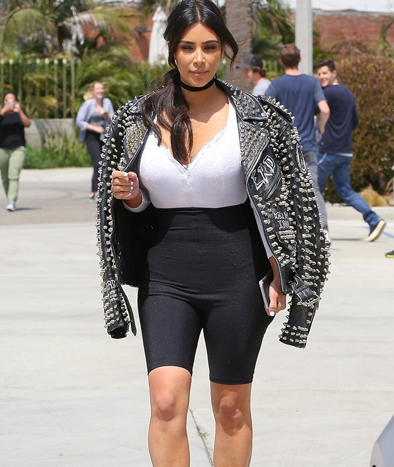 TooFab on X: Kim Kardashian matches $11K studded jacket with biker shorts,  because why not?!   / X