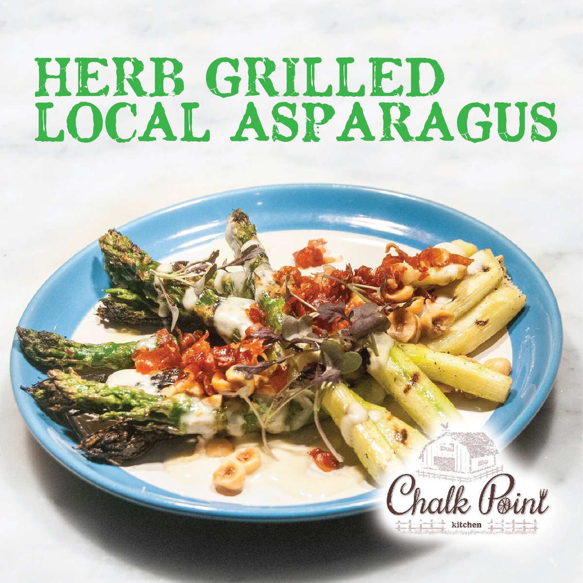 Herb Grilled Local Asparagus at <a href="/chalkpointnyc/">Chalk Point Kitchen</a> served at dinner warm fontina fondue, toasted hazelnuts &amp;crispy speck