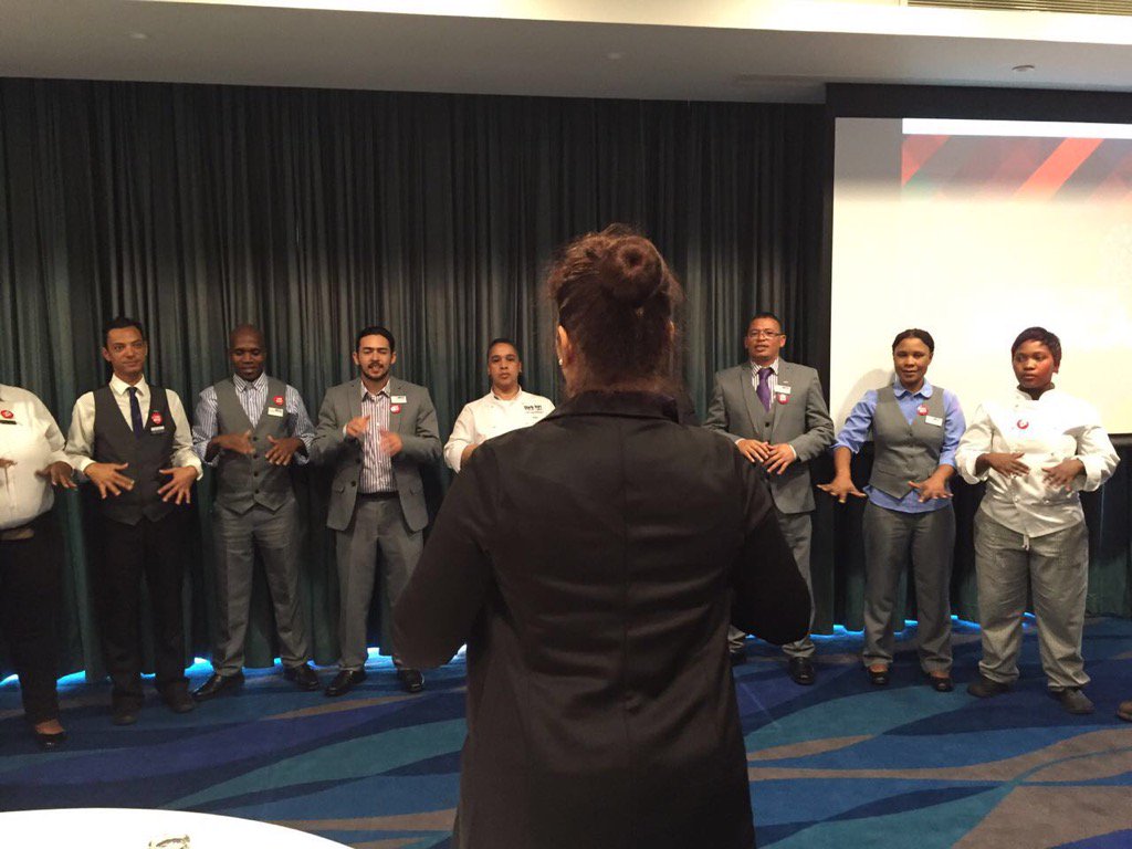 Deaf staff at Park Inn Hotel doing the National Anthem in SASL #solidarityinSASL @ParkInnNewlands