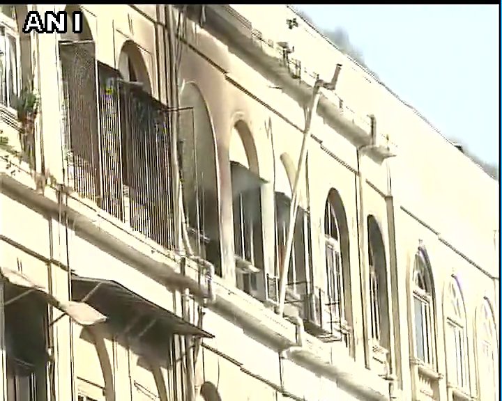 ANI's tweet photo. Mumbai: Fire breaks out in a building near Regal Cinema in Colaba. Eight fire tenders at the spot https://t.co/Shwikq3k3w
