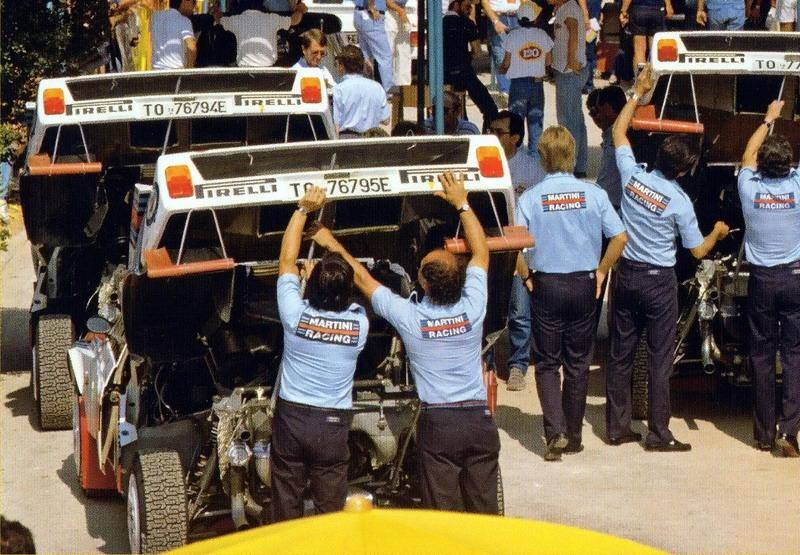 wrc1986's tweet photo. El equipo Lancia al completo pasando las inspecciones técnicas #Acropolis86 https://t.co/ph3Sd3nI3E
