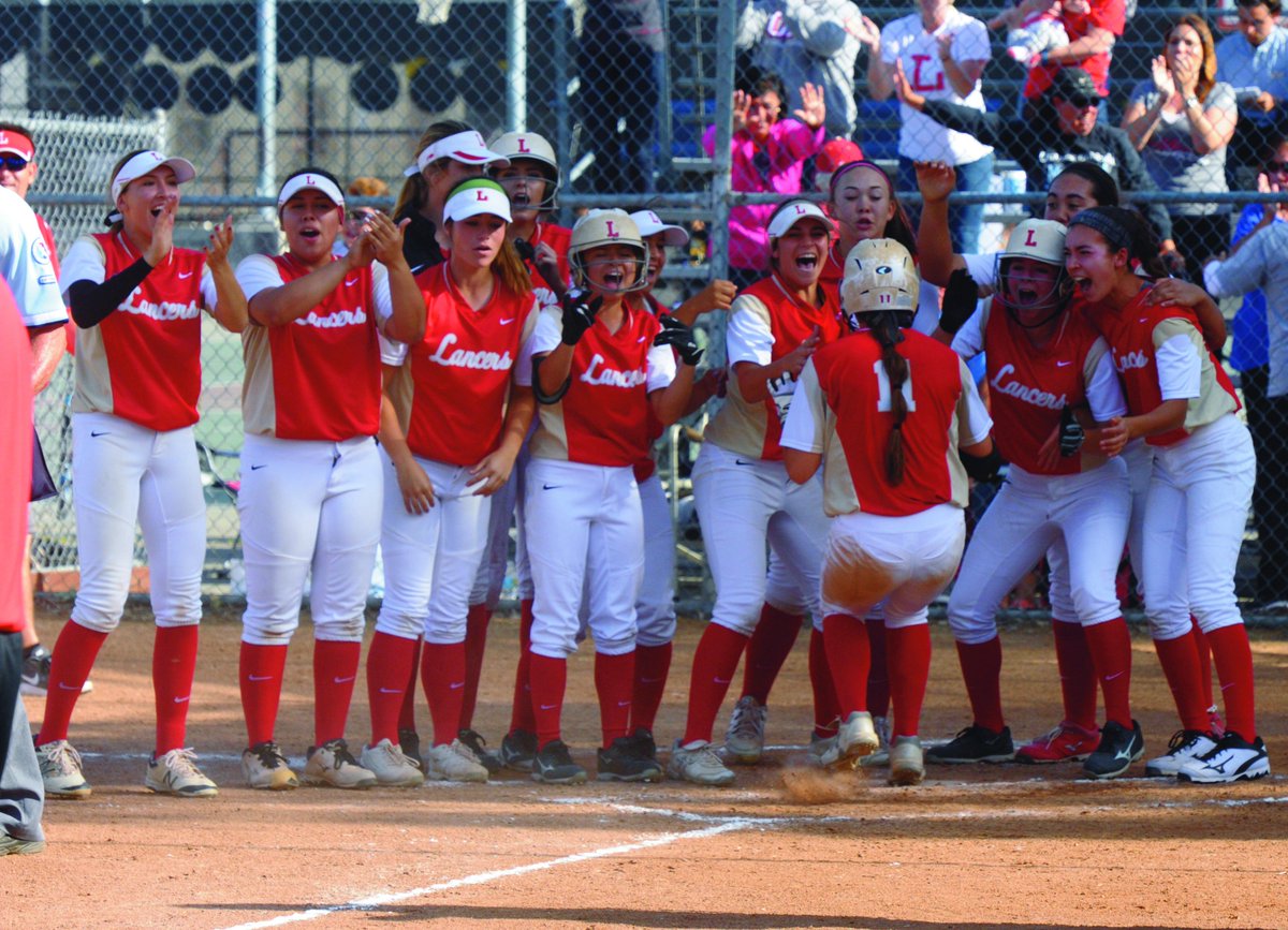 Mackenzie Boesel from @WeAreOLu gets a warm welcome, after hitting a home run against #MissionViejo HS. OLu won, 6-2