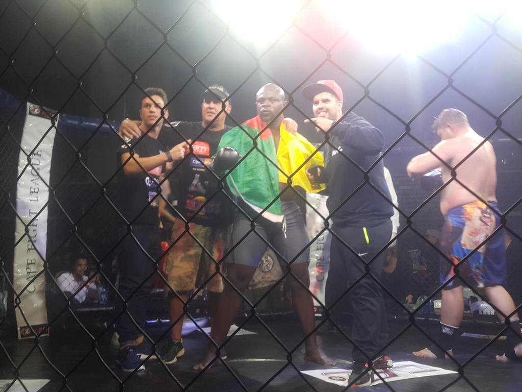 CapeFightLeague's tweet photo. And new Heavyweight champ Yamdjie by KO here at #cfl15 https://t.co/dcj7QyU16e