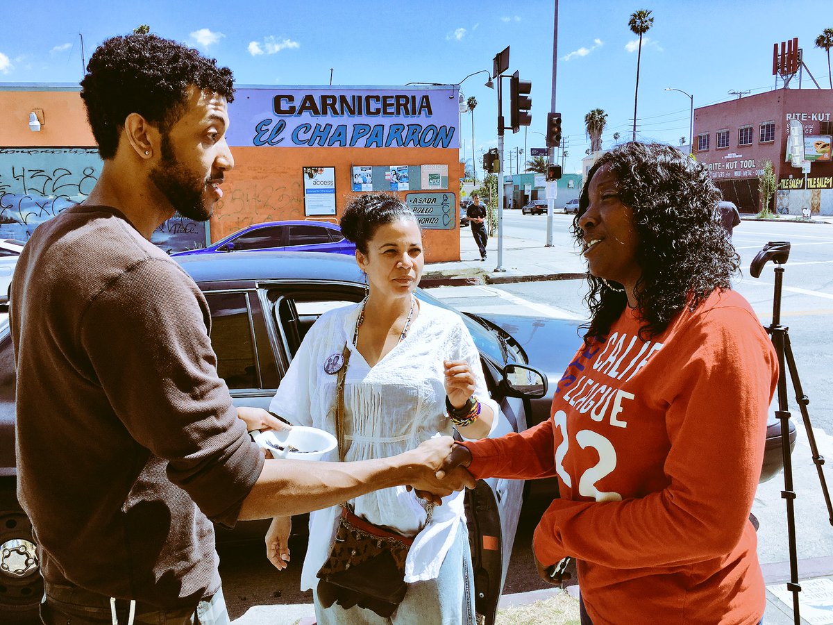 Tritobia Ford thanks artist <a href="/4oremost/">Foremost</a> for putting up new mural of her son #EzellFord. #SouthLA #MyDayInLA