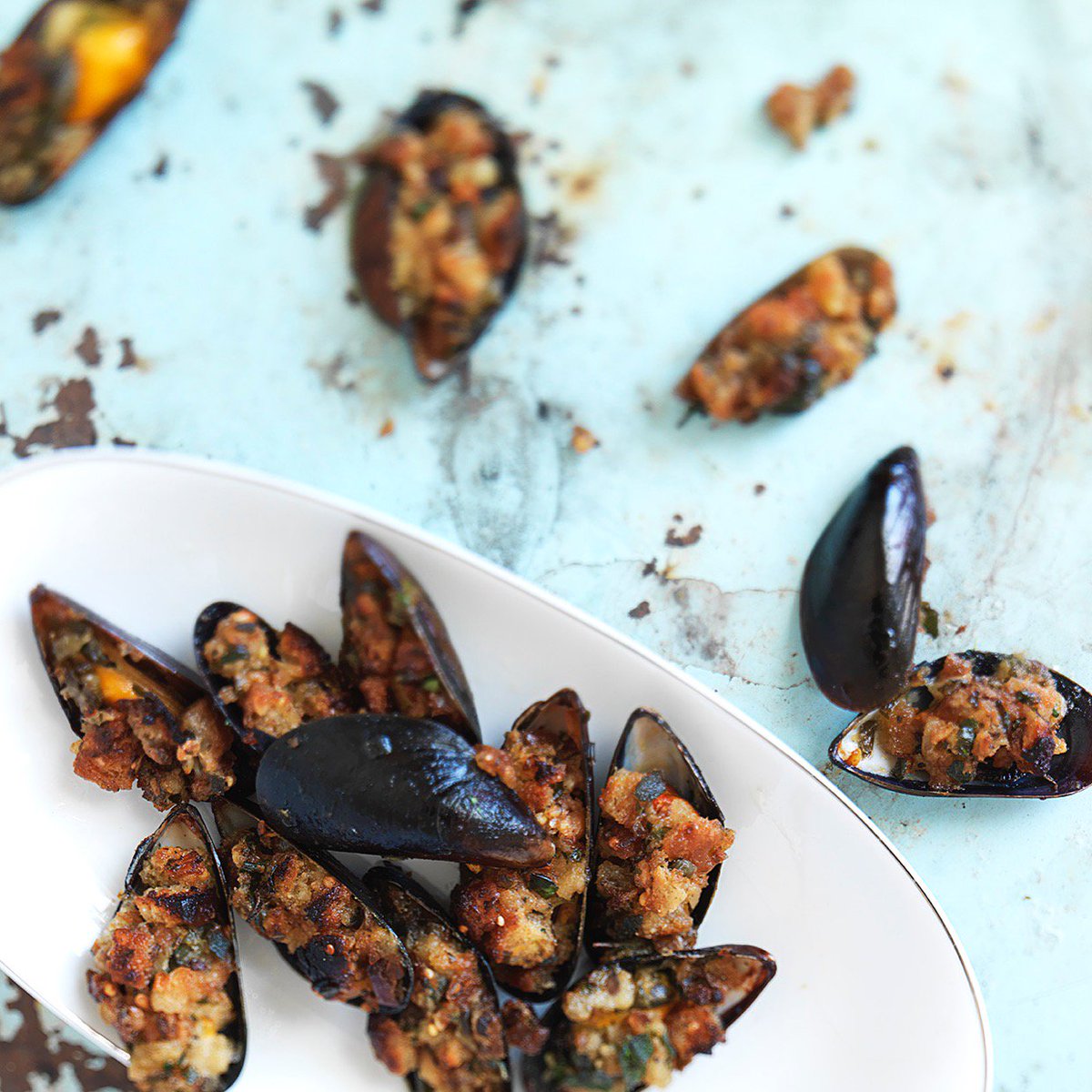 Mussels grilled with capers, sage, breadcrumbs, lemon and garlic #seafood #canape #summer #mussells #simple