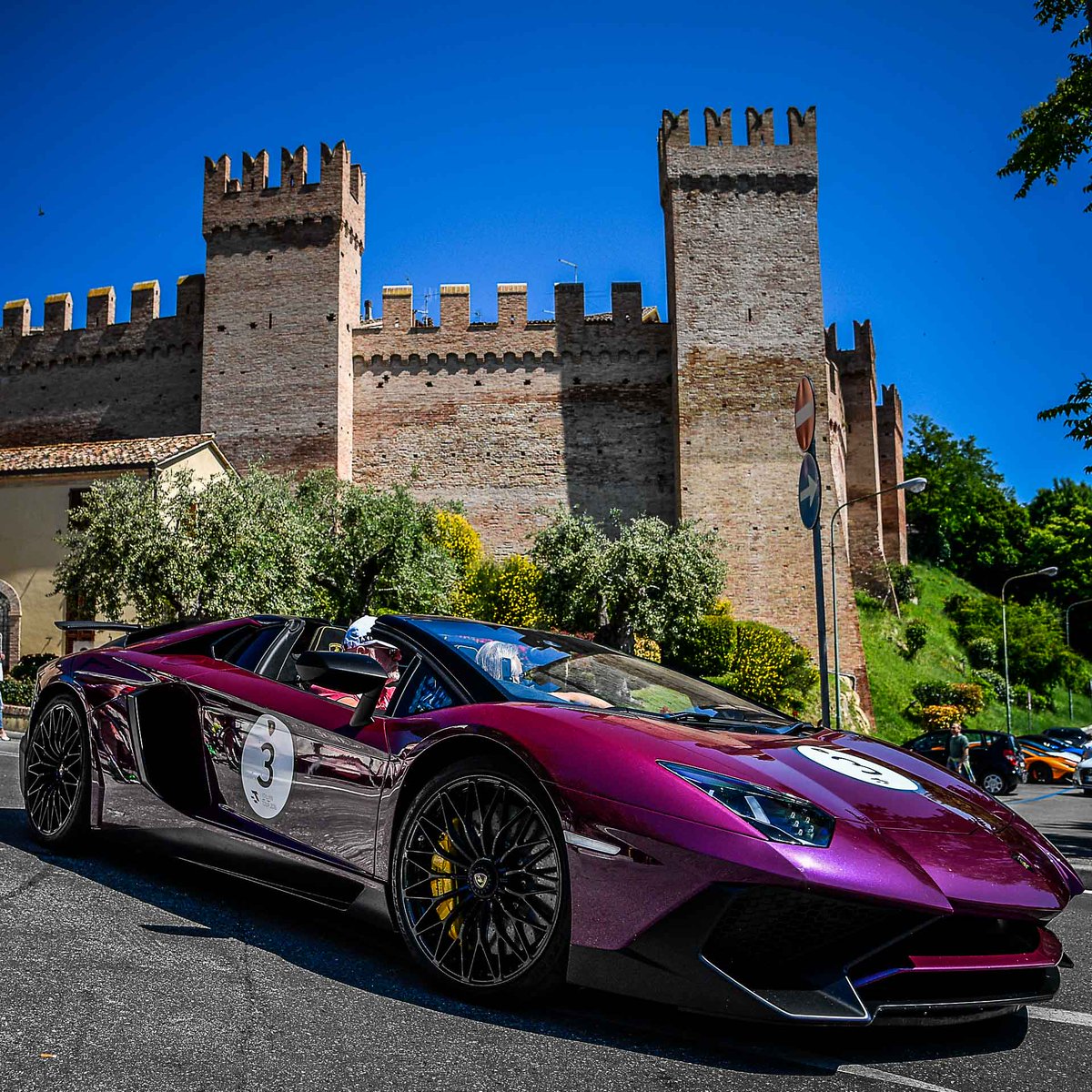 Lamborghini's tweet photo. The Italian Tour Day 2: Along the Panoramica to reach the castle of Gradara, then towards San Leo. #LamboTour #Italy https://t.co/7qxh78DY2f