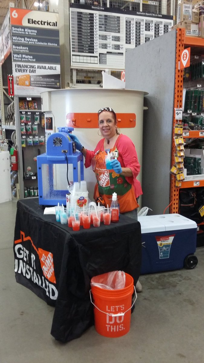 Feeling the chill making snow-kones  and happy kids at 3911!!