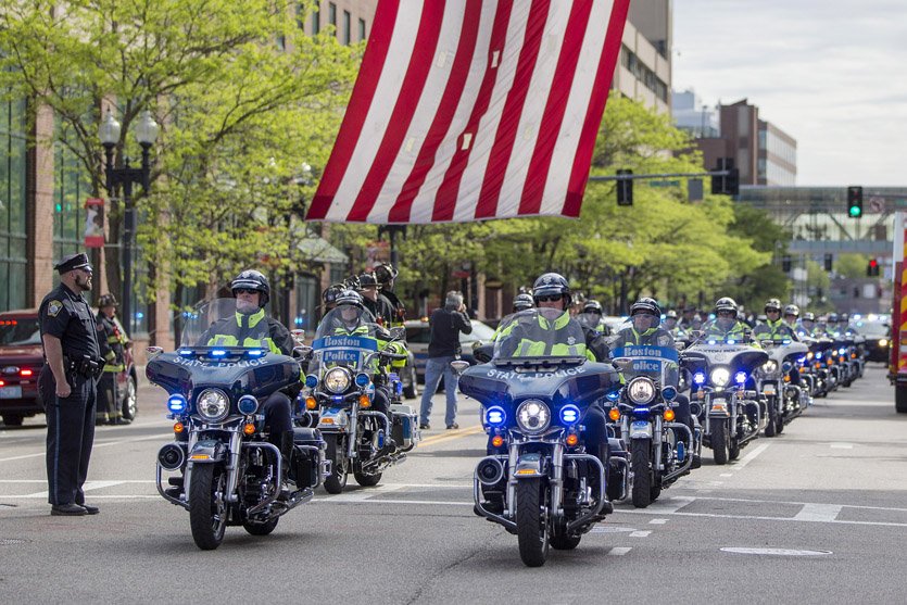 BostonGlobe's tweet photo. Police officers from agencies across Massachusetts honor Auburn officer slain on duty Sunday https://t.co/ozDd9bpVgE https://t.co/DkopnaAZU0