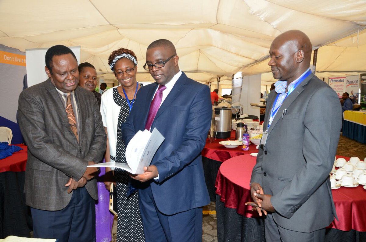 elo_mapelu's tweet photo. @KPA_Nairobi @PharmaKenya @pharmnet_ke @NairobiCountyGo showing the pharmnet quality manual to the minister. https://t.co/w50Chyzk2X
