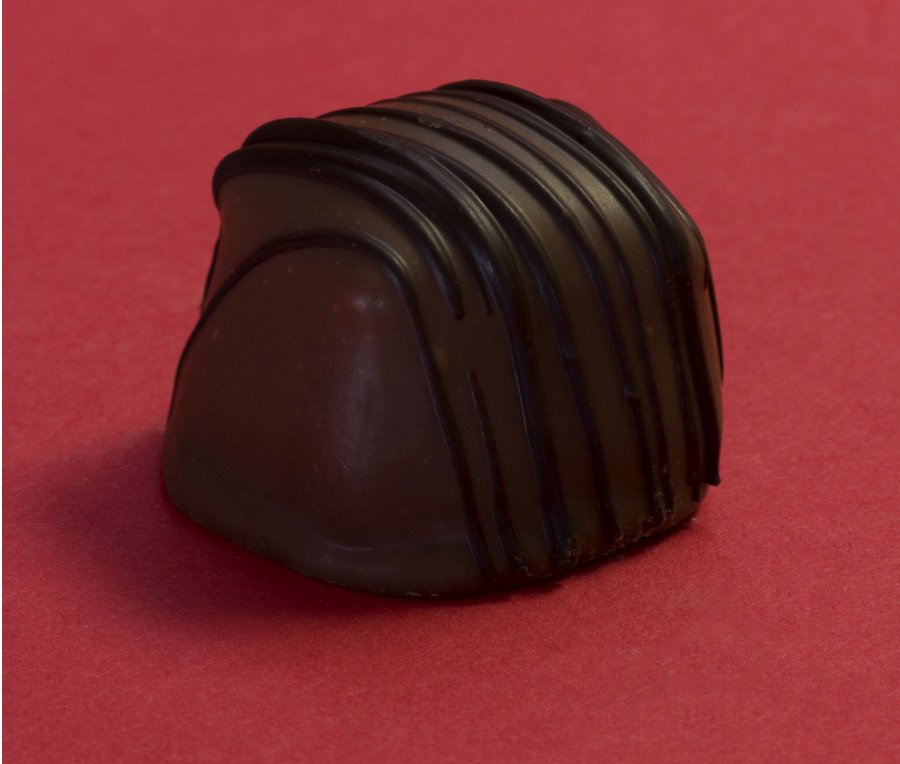 Peanut butter ganache inside, milk chocolate outside, dark chocolate drizzle on top. Enjoy! ow.ly/y8FZ300nqcS