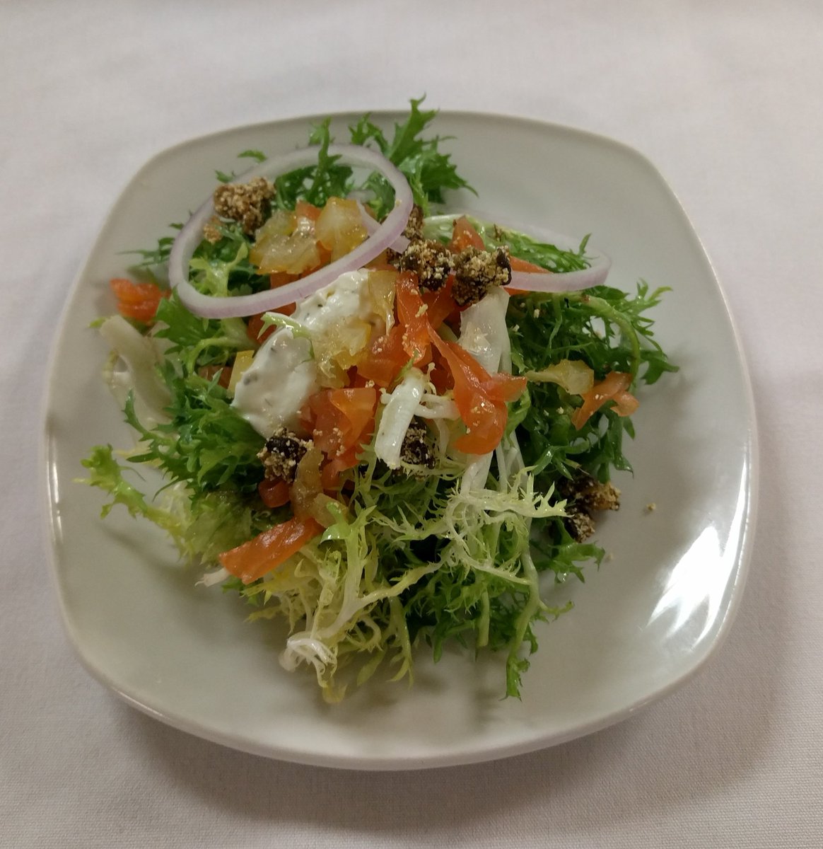 Have you had a chance to try our new vodka-cured salmon? Served on fresh mixed greens with lemon-garlic vinaigrette!