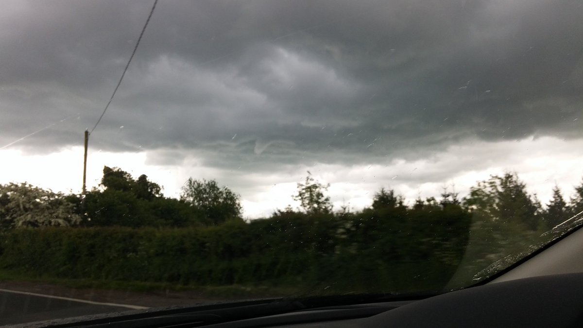 Yesterday's thunder storm. Bad photo on my phone through moving car's windscreen (I wasn't driving!). Was very dark!
