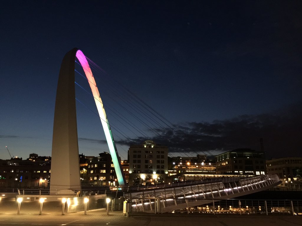NickFairley's tweet photo. Millennium Bridge at dusk. #rainbow #proudgeordie https://t.co/Ggm2wWHP2H