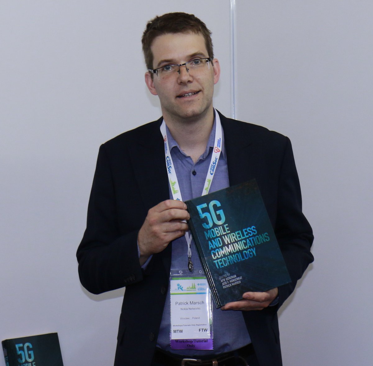Patrick Marsch at <a href="/IEEEICC/">IEEE ICC</a> in Kuala Lumpur earlier today with the first signed copy of the #5Gbook #5G
