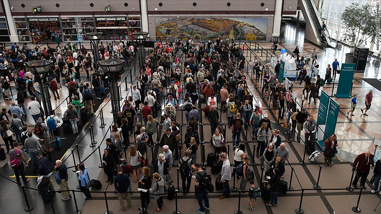 CNN's tweet photo. Fliers are already waiting hours to get through airport security. Here comes Memorial Day... https://t.co/ich3CQCPEX https://t.co/2uat052vaN