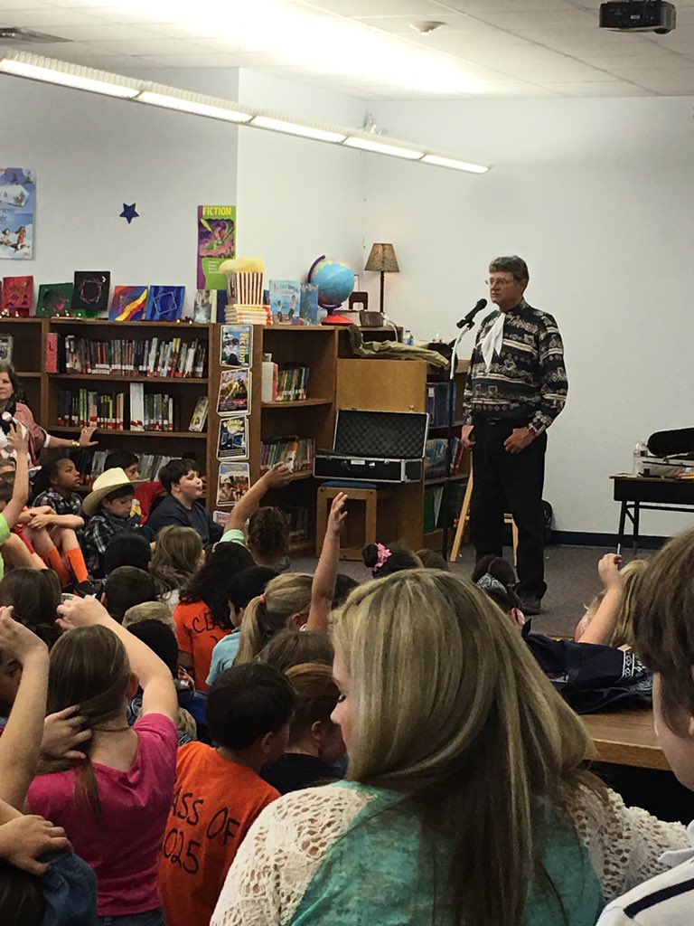 Mrs_Straley's tweet photo. We had a special visitor at school today! Fun times! Tank meets Hank the Cowdog's author, John Erickson. #packsaddle https://t.co/OnKI8C9vei