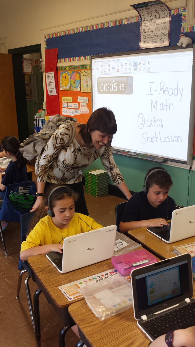 CWCatholicSchls's tweet photo. Principal Spicer @StPetersYonkers looks on as students in @Bwatson_ics class complete their assignments #ICSBL https://t.co/Avmtjiji8T