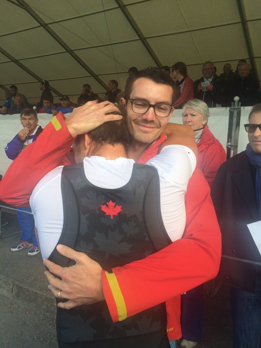 Cedric Berrest, who didn't qualify FRA M1x, hugs old partner <a href="/JulienBahain/">Julien Bahain, OLY</a> after CAN M4x success. Tears of joy.