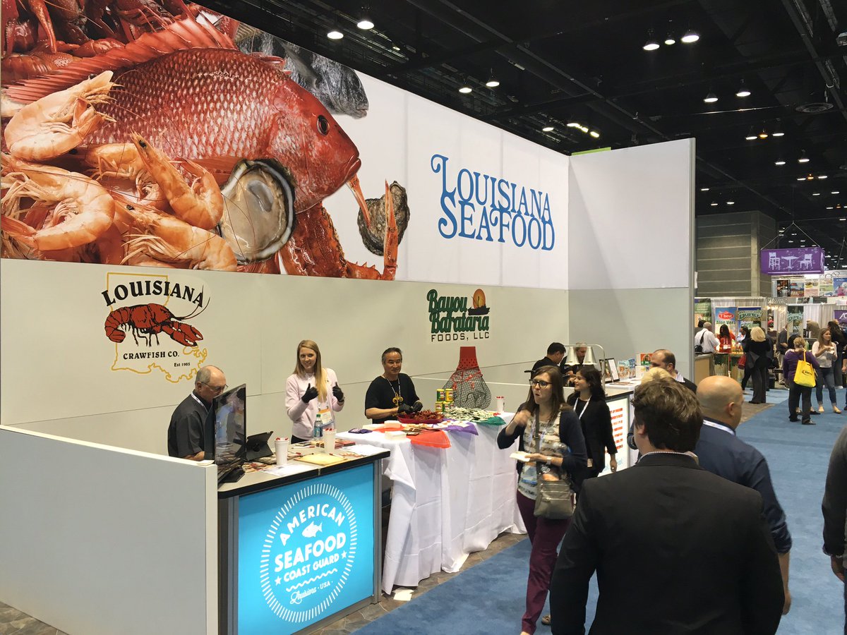 SynergyDG's tweet photo. @LaSeafoodBoard visitors sampling #LouisianaSeafood at the #NRAShow in @ChooseChicago! #SynergyDesignGroup https://t.co/yv8mKLwP9F