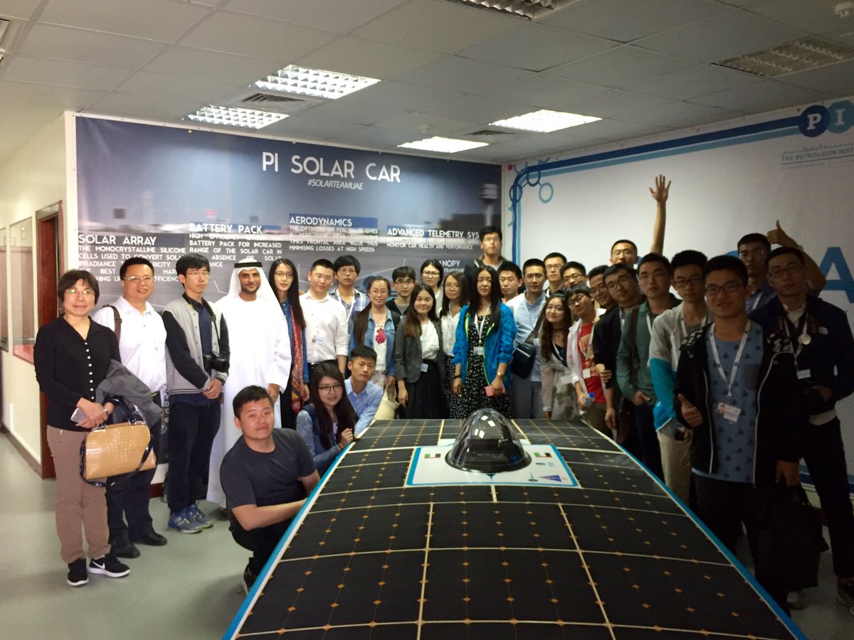 A group of scholars and students from Chinese Universities visiting the <a href="/PISolarCar/">PI Solar Car</a> workshop.