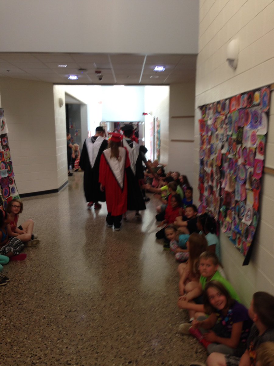 BuchlerScott's tweet photo. Senior walk through today for our elementary students!   So powerful! Thanks seniors! Thanks NWEL and NWEE! https://t.co/RroyANuPBk