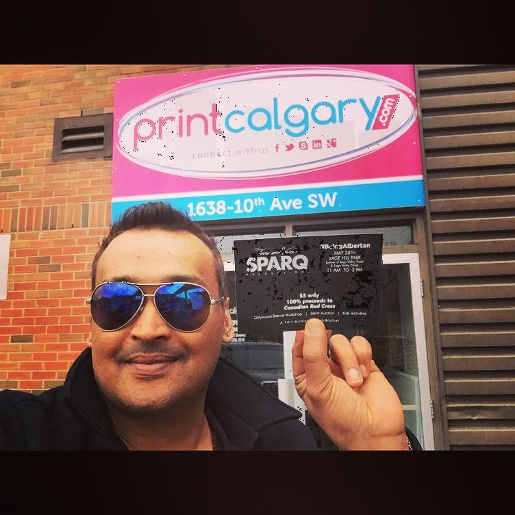 printcalgary's tweet photo. Check out Vishal in front of our Print Calgary building with his #BeingAlbertan Cards. The event is on May 28th!! https://t.co/6O0G0HPz0j