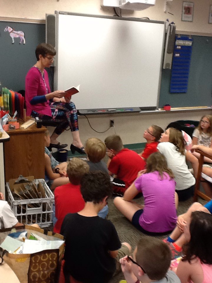 CES_BAUER's tweet photo. Reading from "Kite Fighting" book to learn how to fly our #kiddesigned kites #Ces #stem https://t.co/oXkS3xFpRB