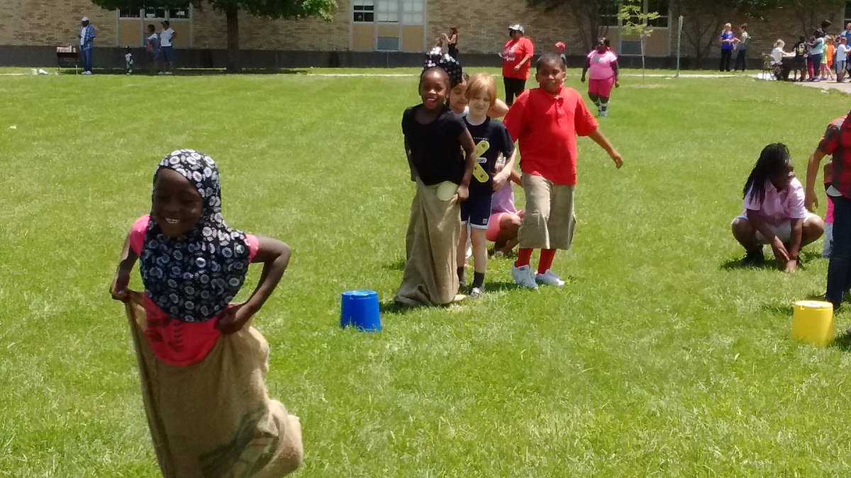 Action! #FieldDay <a href="/KMontessoriJCPS/">Kennedy Montessori</a> sack races!