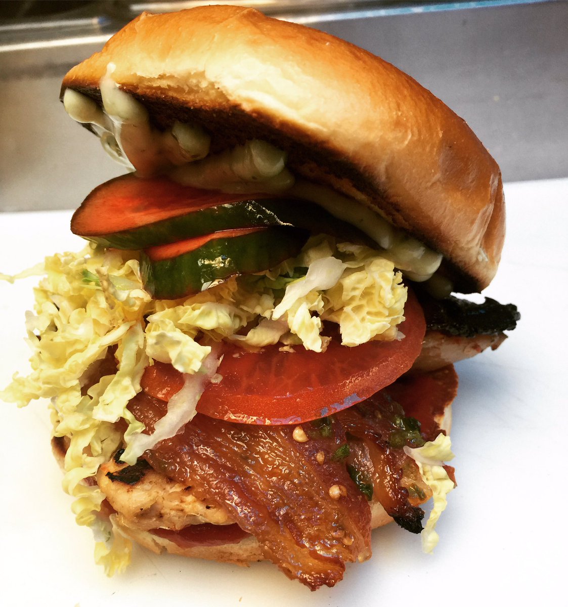 AttilaTheHUNgry's tweet photo. The first Attila Club Sammich! #yegfood #yegfoodtrucks #foodporn #bacon #KoolAidPickle https://t.co/NWfcob4mHw